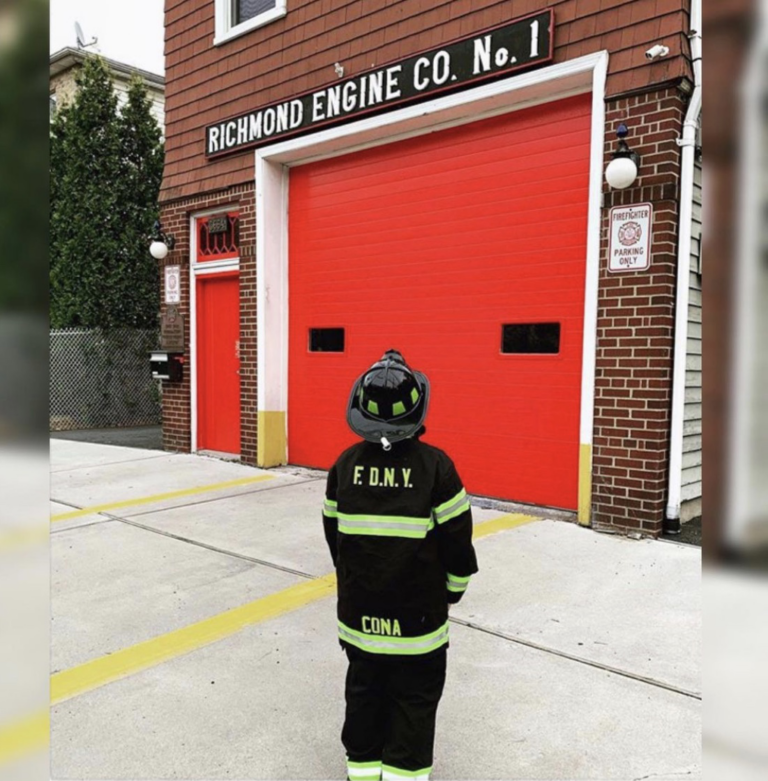 Richmond Engine Co 1 Member standing out front of the station